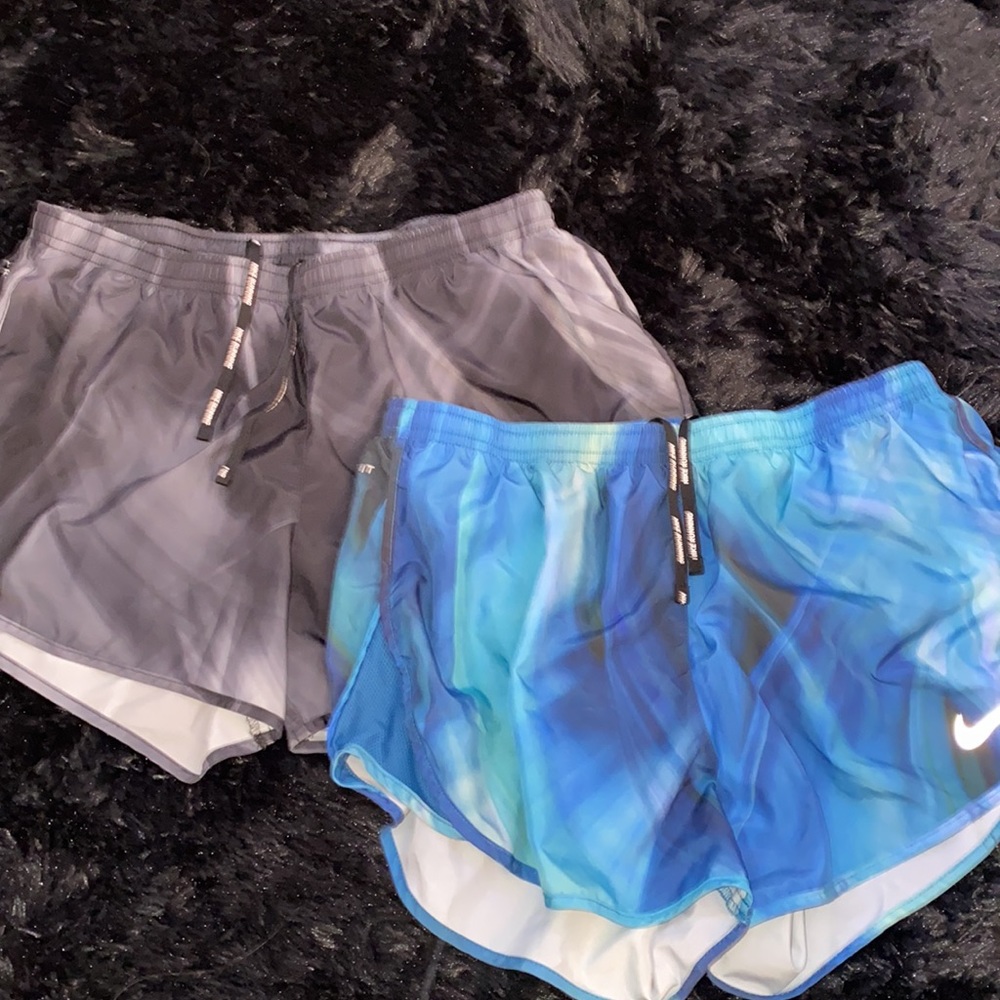 Both Gray/ black and teal/blue Nike dri-fit gym shorts